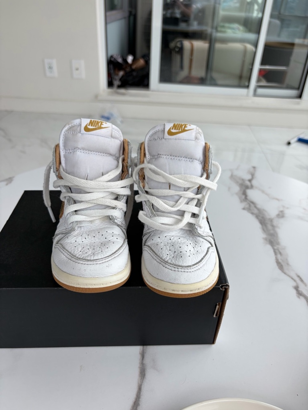 Nike Kids White and Tan High-Top Sneakers with Gold Logo Accent